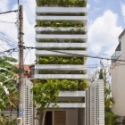 Maison Origine-conçu la résidence familiale, au Vietnam, affichant des façades verts
