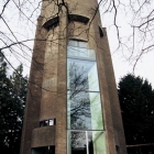 Maison Conversion innovante : 1931 Château d'eau transformé en appartement moderne