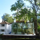 Maison Ajout de verre contemporain qui ornent une maison du XVIII siècle