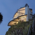 Maison Maison de plage avec parois en verre Transparent et un intérieur moderne
