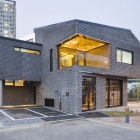Maison Maison contemporaine basalte-brique construite durablement en Corée du Sud
