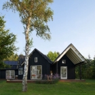 Maison Maison de Village rustique intégrant des éléments danois traditionnels Powerhouse